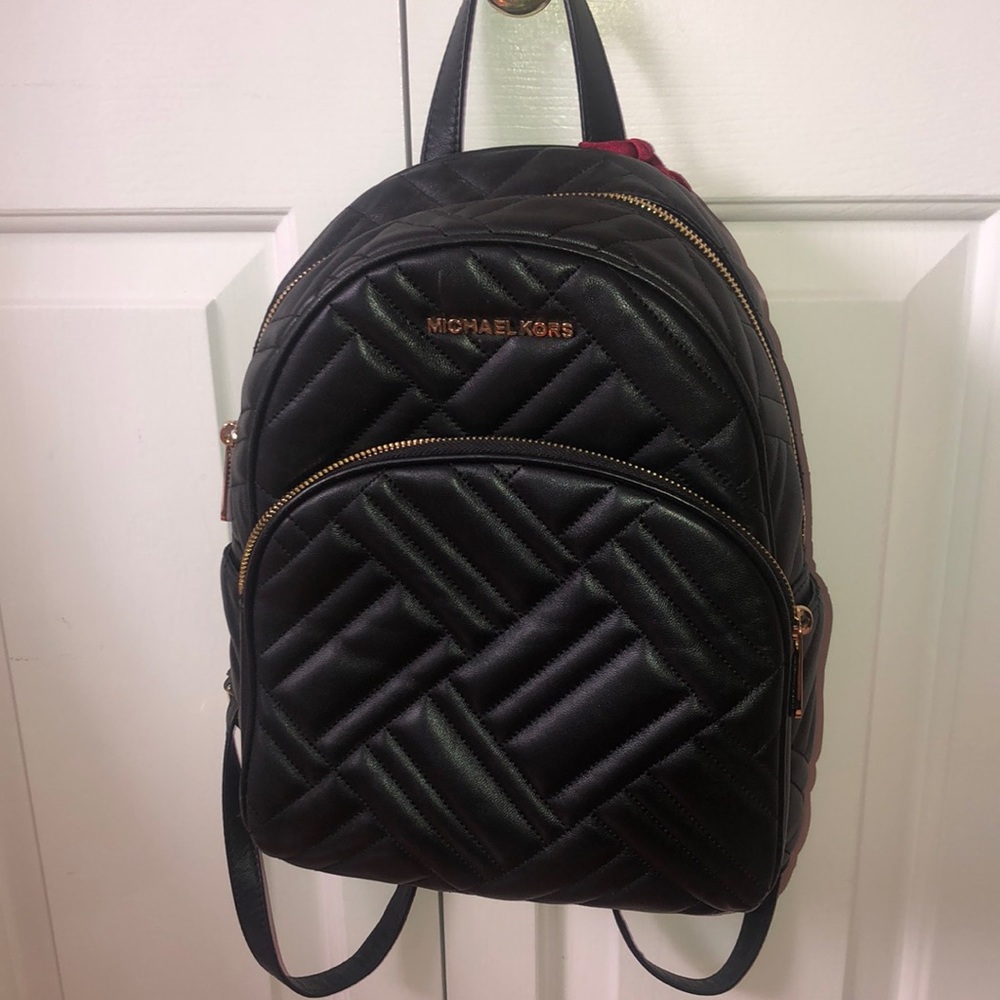 Michael kors black leather back pack
